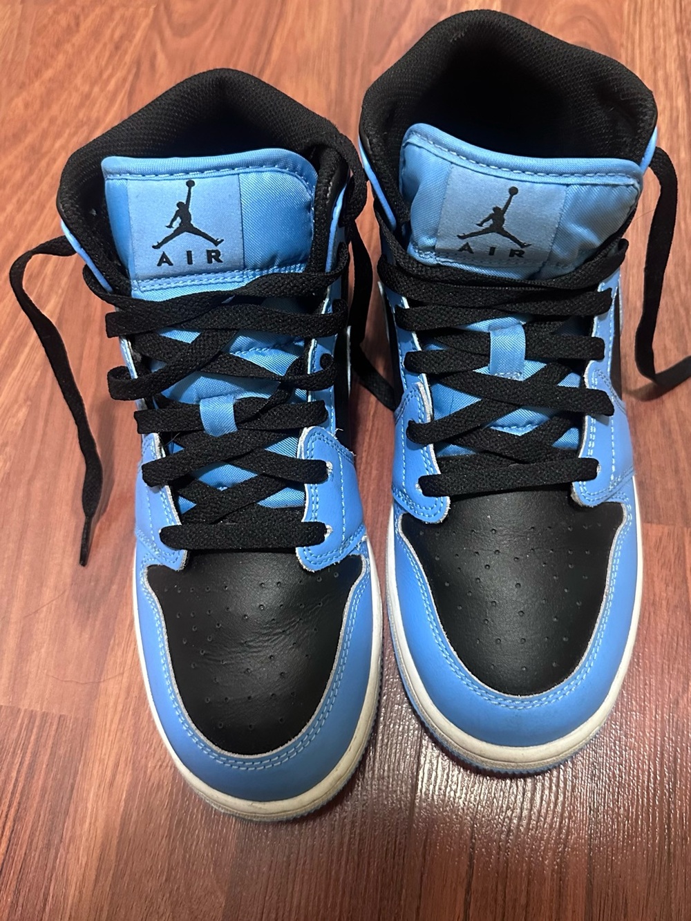 Jordan Youths Light Blue and Black High-Top Sneakers